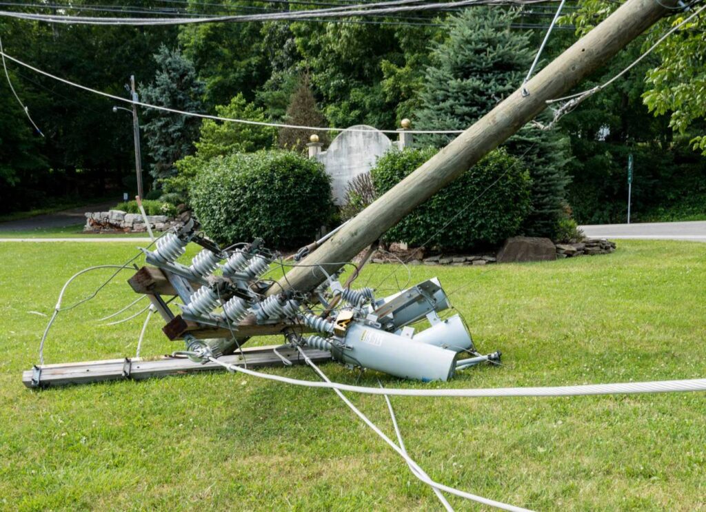 Image of broken power pole time for a back up power generator